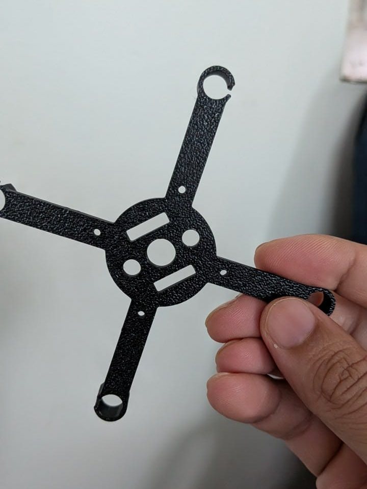 The underside of the printed frame, with the textured finish of the print bed